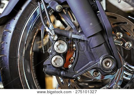 Cropped Close Up Shot Of Beautiful And Custom Made Motorcycle In The Workshop