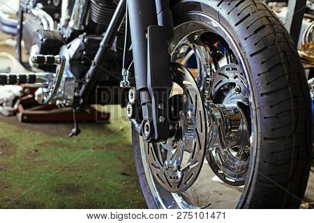 Cropped Close Up Shot Of Beautiful And Custom Made Motorcycle In The Workshop