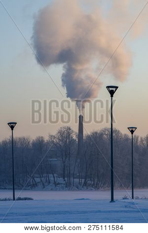 Riga View In Winter; Riga, Capital City Of Latvia In Winter Time. View Of Riga With Frozen River Dau
