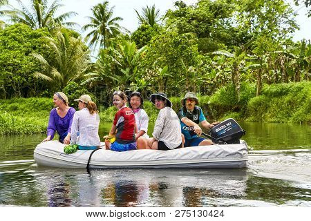 French Polynesia, Tahaa, December, 29, 2017 - Group Of Travelers On An Inflatable Boat Exploring The