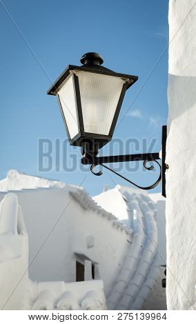 Typical Residence With White Wall Roof And Street Light Of Fishing Village Binibeca Menorca Spain