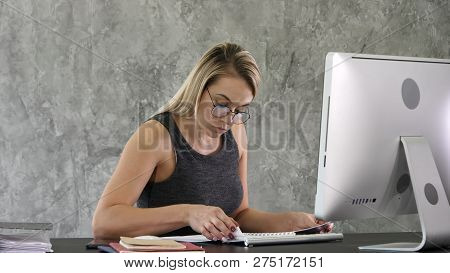 Development, Authority, Feminity Concept. Pretty Business Woman Is Sitting At Her Light Modern Work 