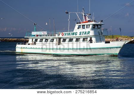 Montauk, New York-august 14: The Fishing Party Charter Boat Viking Star Is Seen Entering Montauk Har