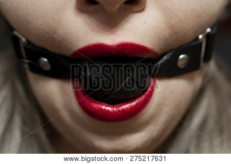 Gag In Mouth. Bdsm And Fetish Sex Concept. Red Lips