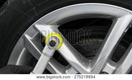 Car Polish Wax Worker Hands Polishing Wheel. Buffing And Polishing Car Disk. Car Detailing. Man Hold