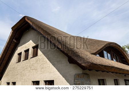 Traditional Thatched Roof From Reed, Sunny Summer Day