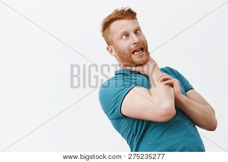 It Is Gonna Chuckle Me. Portrait Of Funny Carefree And Playful Redhead Guy With Bristle, Bending Bac