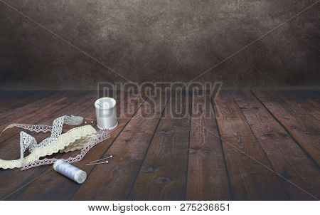Lace And Spoos Of Threads Cark Background