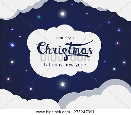 Lettering Merry Christmas And Happy New Year On The Night Sky Behind The Clouds With Shining Stars