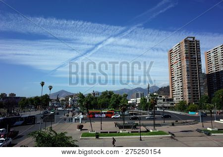 Santiago, Chile - 26 November, 2018: view of Santiago downtown with aicraft trace in sky