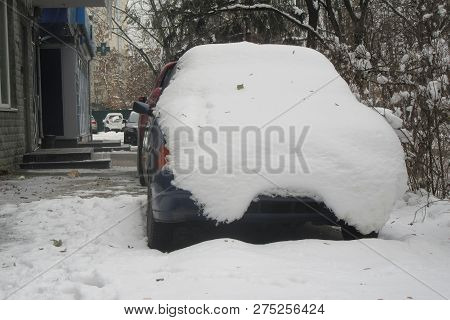 Snowstorm, Snow-covered Street And Cars. Cars Covered In Snow During Snowstorm Cars Covered Snow Win