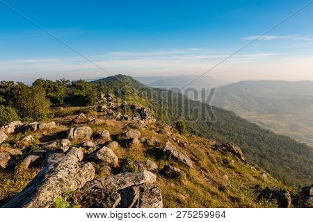 top mountain rock / mountain top view forest rock stone hill nature - landscape  rocky mountains blue sky background