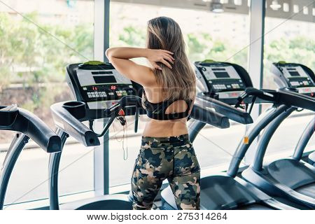 Young Fit Woman Doing Running Exercise In Gym