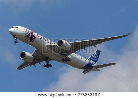 Farnborough, Uk - July 16, 2014: Airbus A350-941 Commercial Aircraft With A Hybrid Airbus/qatar Airw