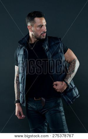 Tattoo Brutal Attribute. Man Brutal Unshaven Hispanic Appearance Tattooed Arms. Bearded Man Posing W