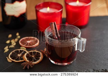 Swedish Glogg, the mulled wine, with cinnamon, anise, cardamom, and dried oranges closeup