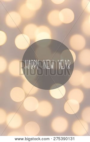 Happy New Year Greeting Card. Beautiful Pastel Color Holiday Background. Golden Garland Bokeh Lights
