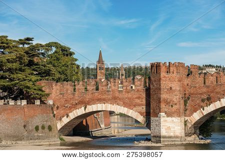 The Ancient Scaligero Bridge (ponte Scaligero) Near Castelvecchio (old Castle) And Adige River In Ve
