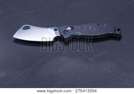 Cook's Knife. Pocket Knife Cook. Knife With A Black Handle.