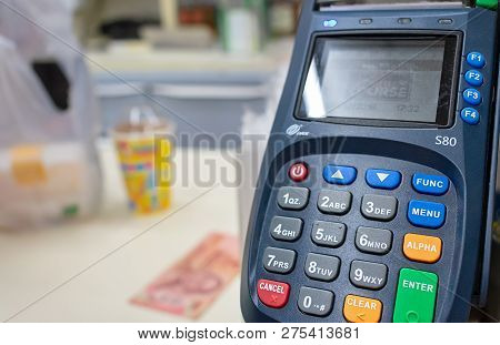 Bangkok, Thailand - December 23: Pos Counter Top Payment Terminal By Pax In Operation In Local 7-ele