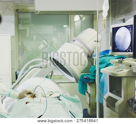 X-ray Machine In Hospital Man On The Couch.