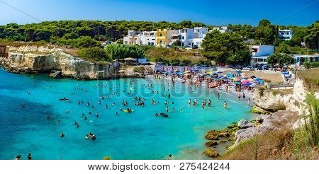 Salento, Lecce, Italy - August 12, 2018: People In Summer Holiday On The Beach In Salento, Enjoying 