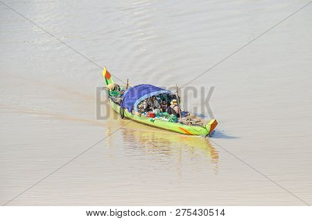 Phnom Penh, Cambodia - April 9, 2018:   Typical Long-tail Cambodian Mekong Boat With A Canopy, An  A