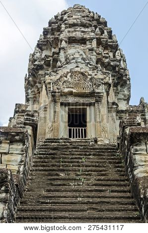 The Ogival, Redented Tower Shaped Like Lotus Bud Of Angkor Wat, And The Very Steep Stairways Represe