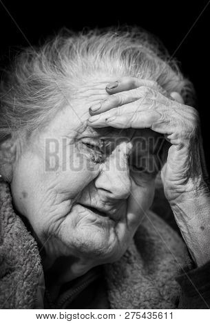 Very Old And Tired Wrinkled Woman Outdoors