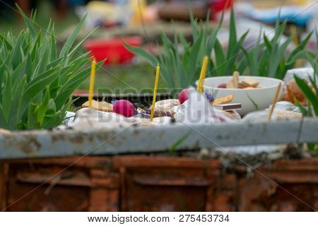 Tocuz, Moldova- 16 April, 2018: Goods On The Graves In The Cemetery Celebrating The Dead During Memo