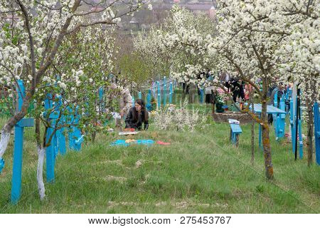 Tocuz, Moldova- 16 April, 2018: People In The Cemetery Celebrating The Dead During Memorial Easter