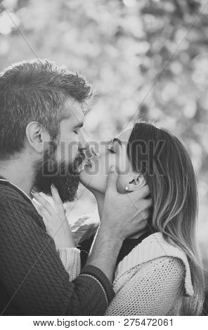 Man With Beard Holds Womans Head With Tenderness, Close Up. Couple With Passionate Faces Want Kiss. 