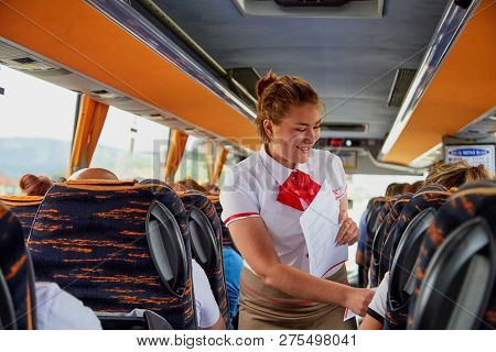 Marmaris, Turkey - May 26, 2018: Female Guide In The Bus With Tourists. People During Travel. Transf