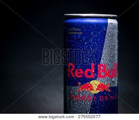 Sankt-petersburg, Russia - December 25, 2018: Aluminum Can Of Redbull Drink With Water Drops Over Da