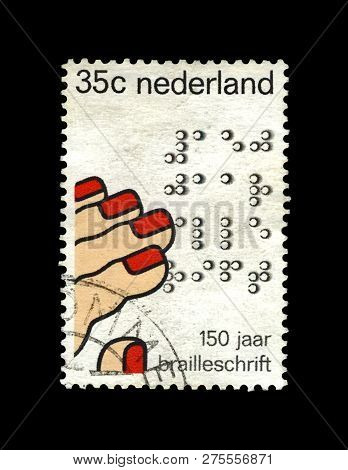 Netherlands  - Circa 1975: Canceled Stamp Printed In Netherlands Shows Fingers Reading Code By Louis