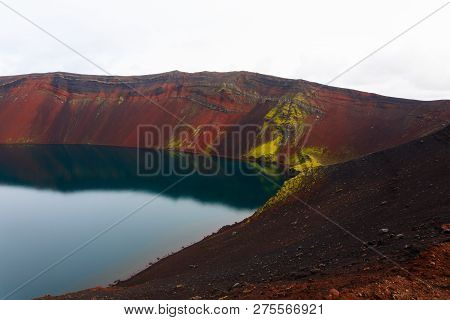 Volcanic Crater With Water Near Landmannalaugar Area, Iceland. Colored Mountains