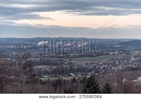 Trinec City With Smoking Trinecke Zelezarny Factory And Smaller Hills On The Background In Czech Rep