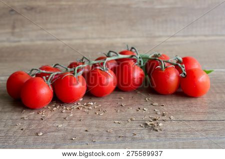 Tomatoes Cherry On Wooden Background. Red Tomatoes. Small Tomatoes