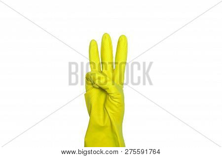 Signs Made Of Yellow Protective Gloves. Fingers Symbol Three. Isolated On White. The Concept Of Clea