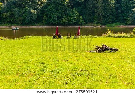 Vilnius, Lithuania - September 02, 2012: People Resting On The Beach, Floating On Boat On Scenic Coa