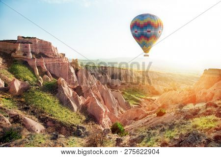 Hot air balloon flying over Cappadocia, Turkey