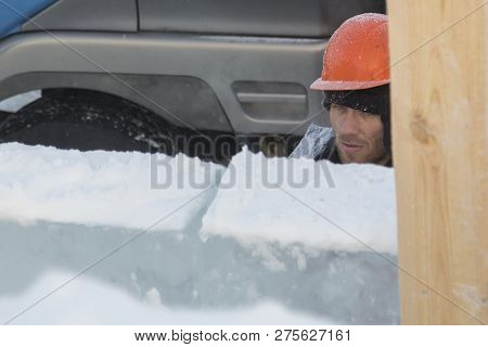 Worker On The Installation Of An Ice Panel