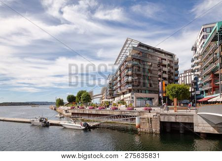 OSLO, NORWAY - JULY 23, 2018: Modern scandinavian architecture at renovated Tjuvholmen waterfront district, part of the Fjord City urban renewal project in Oslo