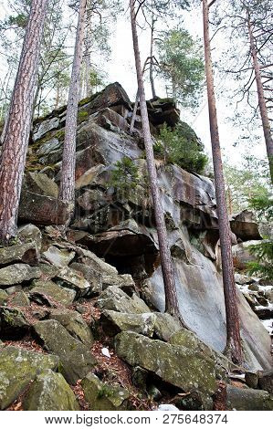Dovbush Rocks In Green Forest At Carpathian Mountains.