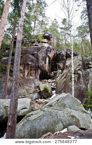 Dovbush Rocks In Green Forest At Carpathian Mountains.