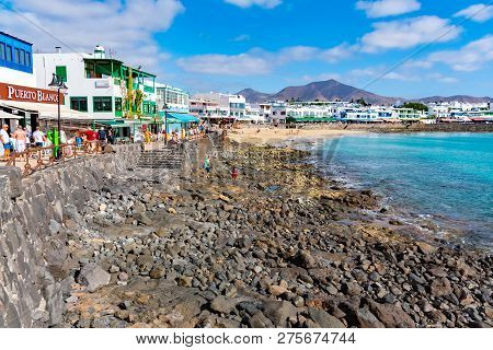 Playa Blanca, Spain - Dec 14: Seaside Promenade In Playa Blanca, The Former Fishermens Village Becam