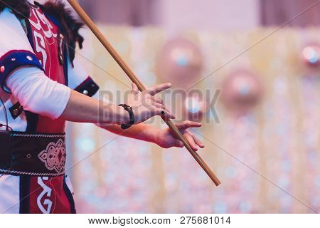 Man In National Costume Play National Music Instrument. Kurai.