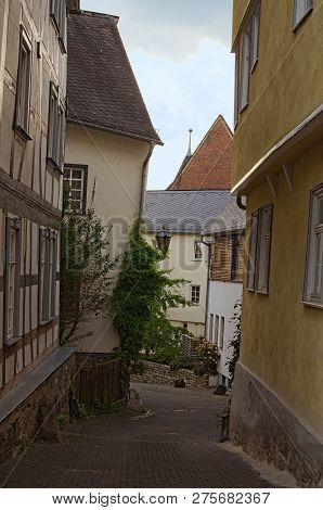 Narrow Cobblestone Street With Colorful Medieval Buildings In A Residential Part Of The Wetzlar City
