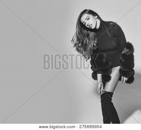 Young Pretty Woman Or Cute Sexy Girl With Long Beautiful Curly Blonde Hair And Adorable Face In Blac