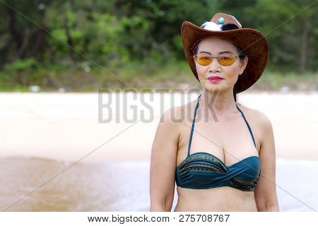 Woman And Hat Portrait Outdoor On Beach At Bang Beot Beach, Chumphon Province Thailand